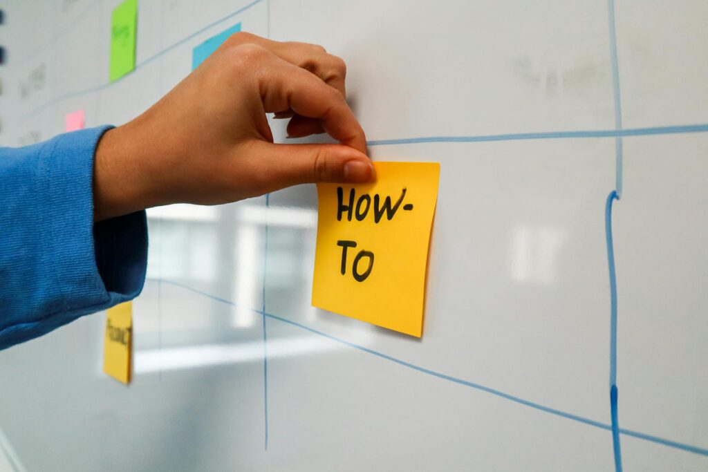 whiteboard with a clear if/then diagram or process steps visible